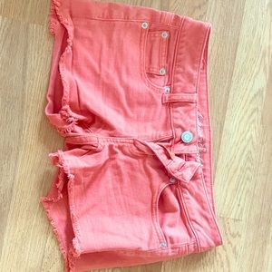 jean shorts peach colored